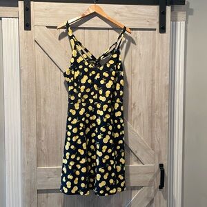 Navy summer dress with yellow lemons.